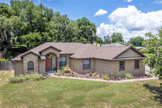 ranch-style house with a front lawn