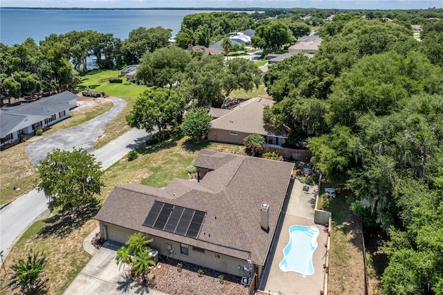 bird's eye view with a water view