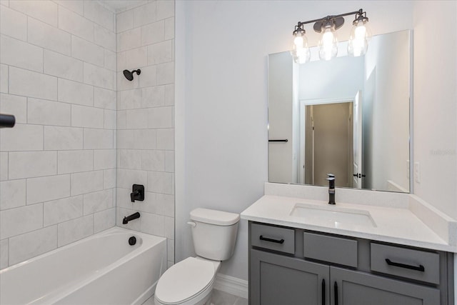 full bathroom featuring vanity, tiled shower / bath combo, and toilet