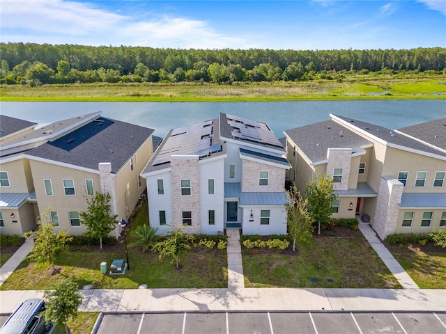 bird's eye view with a water view