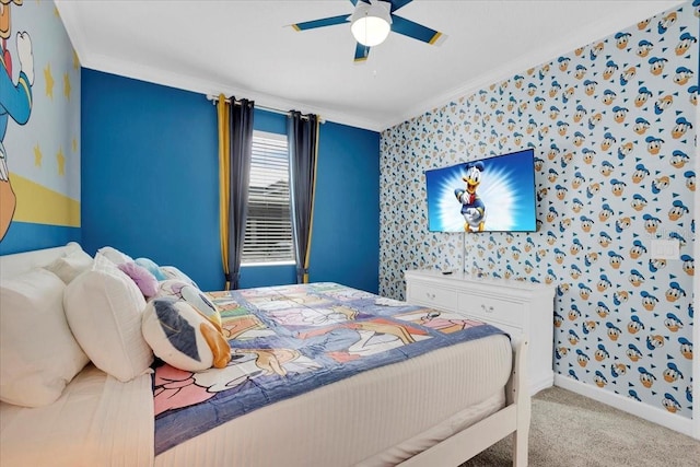 carpeted bedroom featuring wallpapered walls, a ceiling fan, baseboards, and ornamental molding