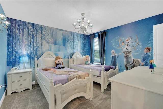 bedroom with wallpapered walls, a notable chandelier, and carpet