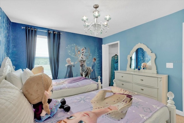 bedroom featuring a chandelier