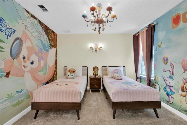 bedroom with carpet flooring and an inviting chandelier