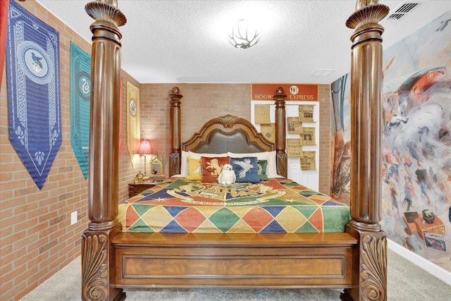 carpeted bedroom with baseboards, brick wall, and a textured ceiling