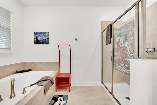 full bath with tile patterned flooring, a bath, baseboards, and a stall shower