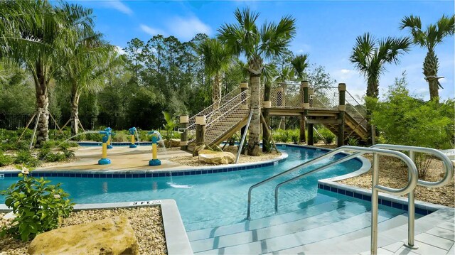 view of pool featuring a deck