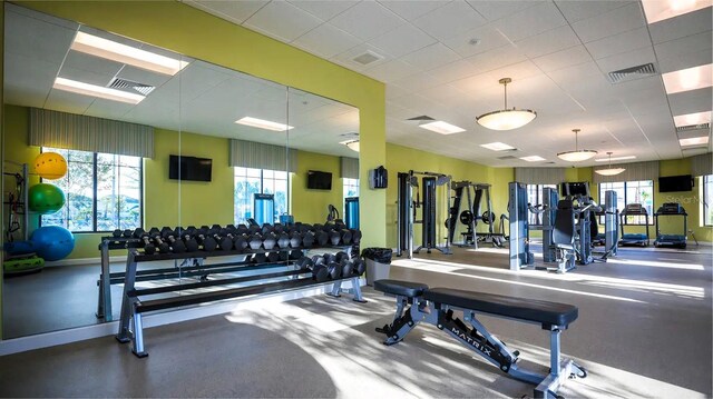 workout area featuring a drop ceiling