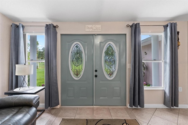 foyer featuring light tile flooring