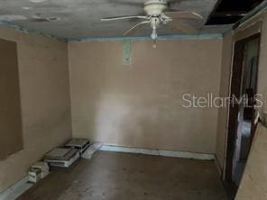 1605 Rose Ln, Eustis, FL 32726 - empty room featuring ceiling fan and unfinished concrete floors