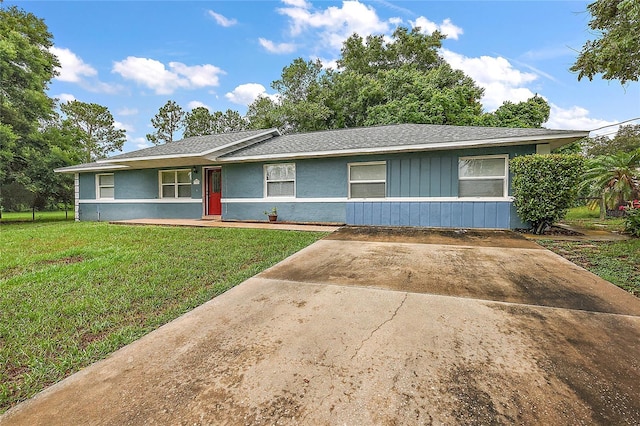 ranch-style house with a front yard