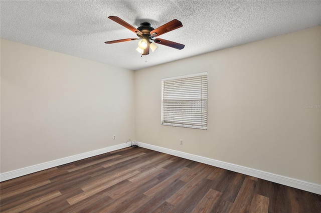 spare room featuring a textured ceiling, dark hardwood / wood-style flooring, and ceiling fan