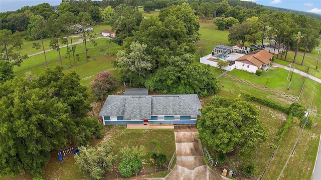 birds eye view of property with a rural view