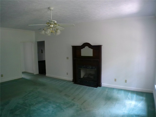 unfurnished living room with ceiling fan, dark colored carpet, a textured ceiling, and a fireplace