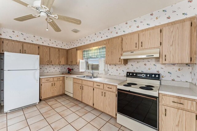 kitchen with white appliances, light brown cabinets, sink, light tile patterned flooring, and ceiling fan