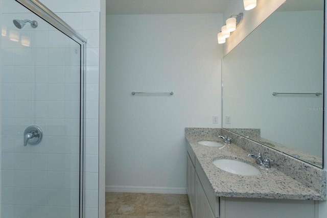 bathroom with vanity and walk in shower