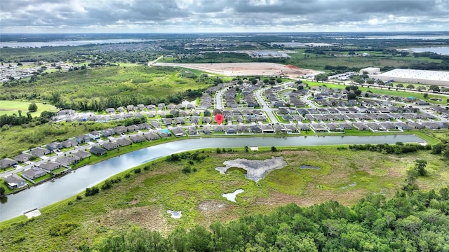 drone / aerial view featuring a water view