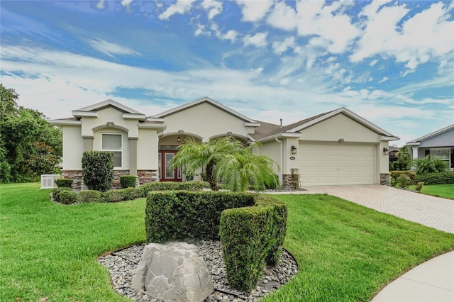 ranch-style house with a front lawn and a garage