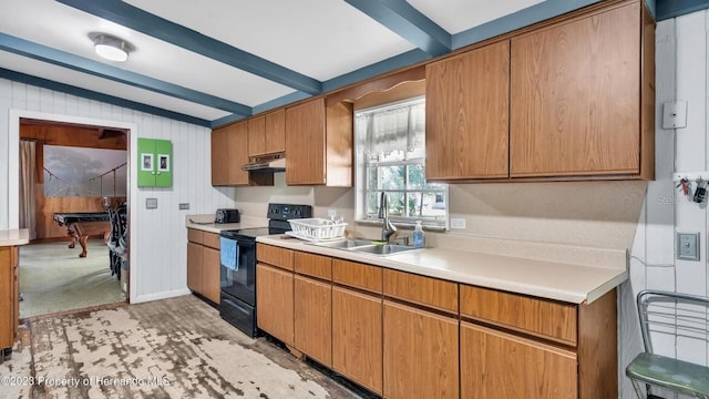 kitchen featuring electric range, light colored carpet, lofted ceiling with beams, and sink