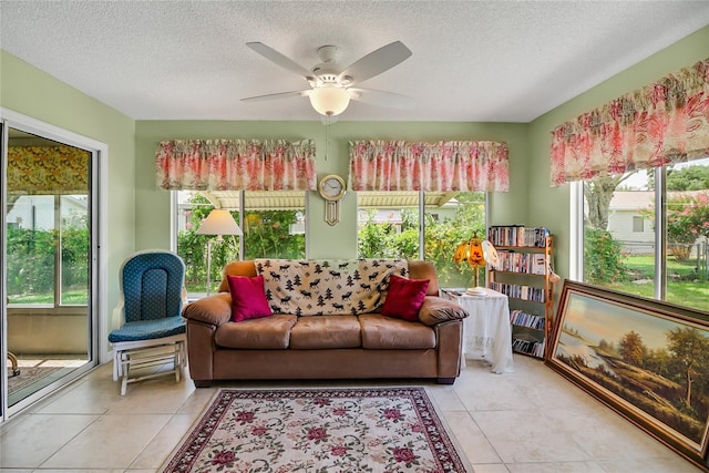 sunroom / solarium with ceiling fan