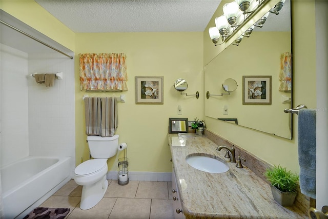 full bathroom with tile patterned flooring, vanity, toilet, and a textured ceiling