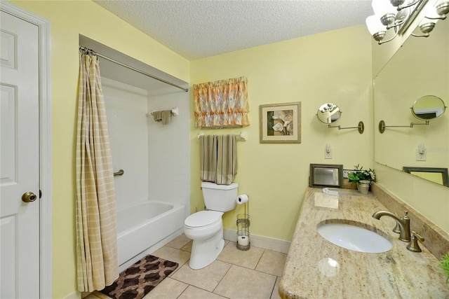 full bathroom featuring vanity, tile patterned floors, toilet, shower / bath combo with shower curtain, and a textured ceiling