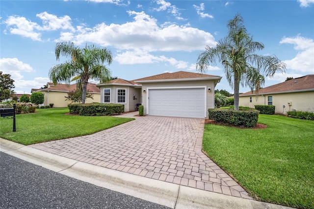 single story home featuring a front yard and a garage