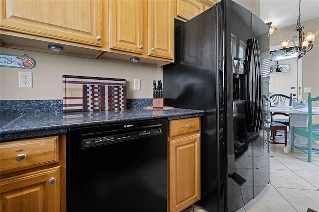 kitchen with black appliances, dark stone counters, pendant lighting, a chandelier, and light tile flooring