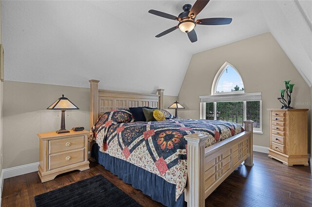 bedroom featuring ceiling fan, vaulted ceiling, and dark wood-type flooring