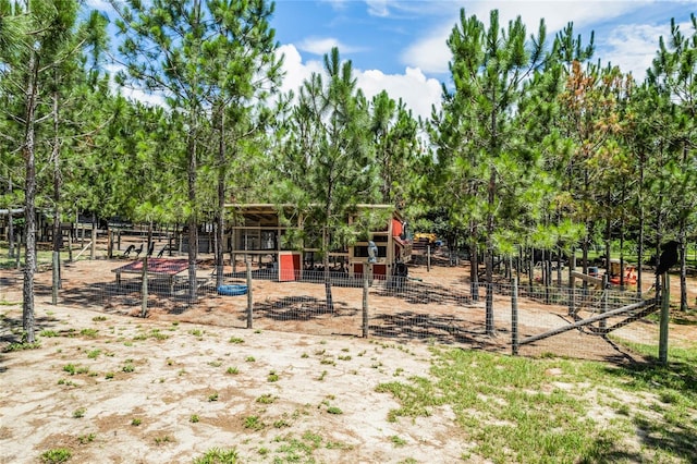 view of play area featuring an outdoor structure