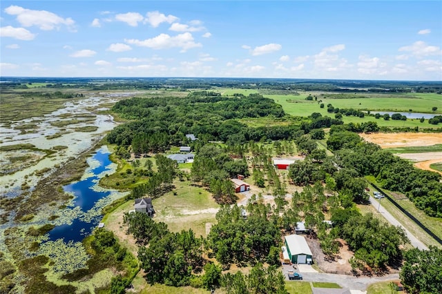 aerial view featuring a water view and a rural view