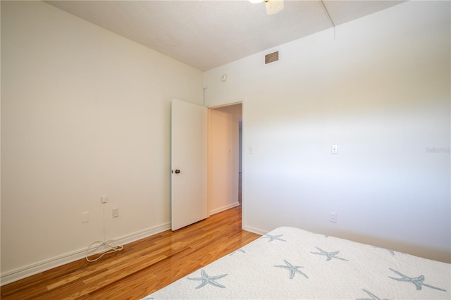 bedroom featuring light hardwood / wood-style floors