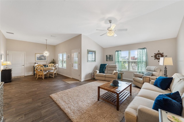 living room featuring a wealth of natural light, dark hardwood / wood-style flooring, and ceiling fan