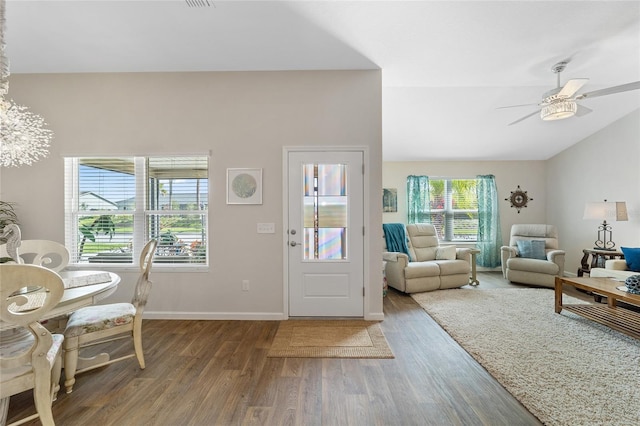 living room with hardwood / wood-style flooring and ceiling fan