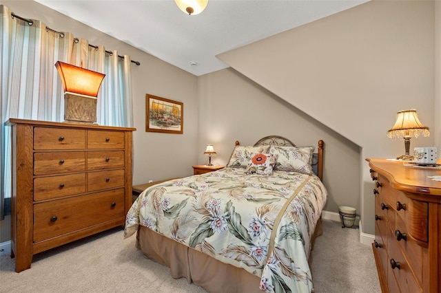 bedroom with light carpet