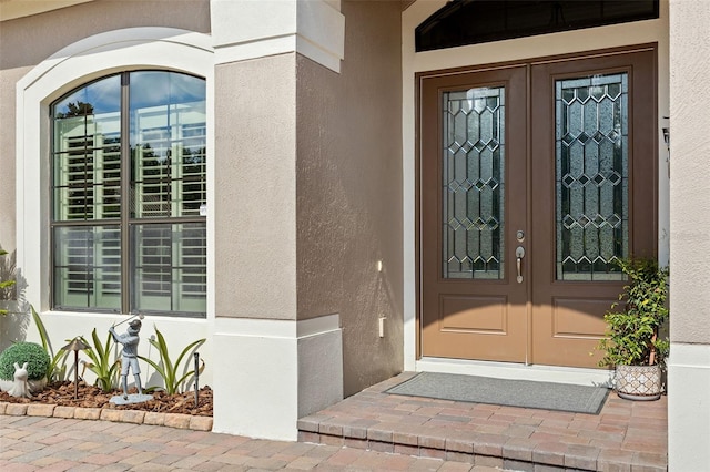 doorway to property with french doors