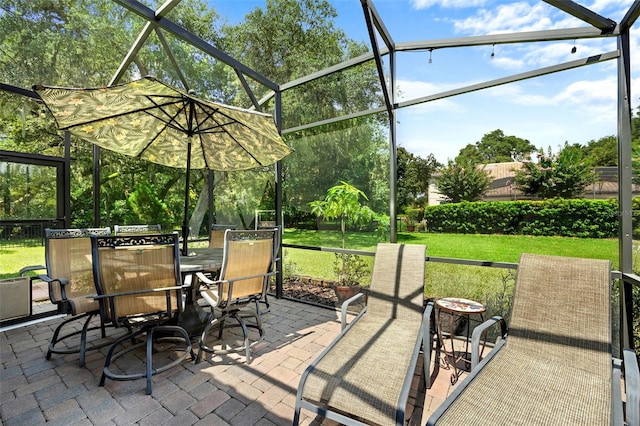 view of patio / terrace with glass enclosure