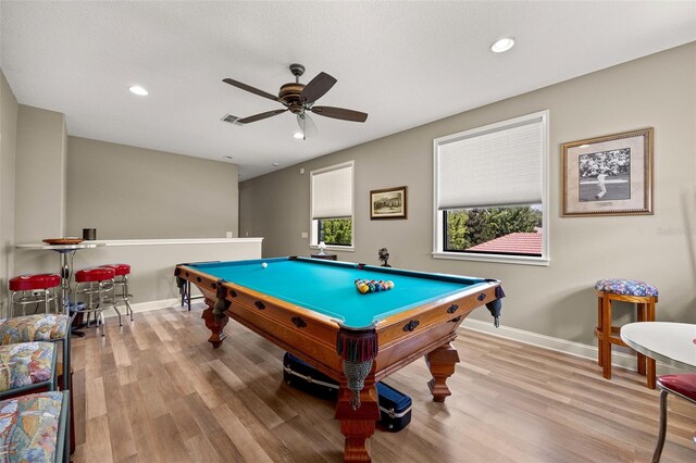 game room with ceiling fan, pool table, and light wood-type flooring