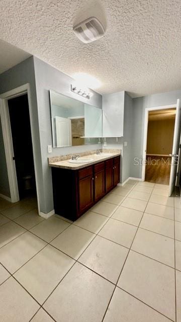 bathroom featuring vanity and tile patterned floors