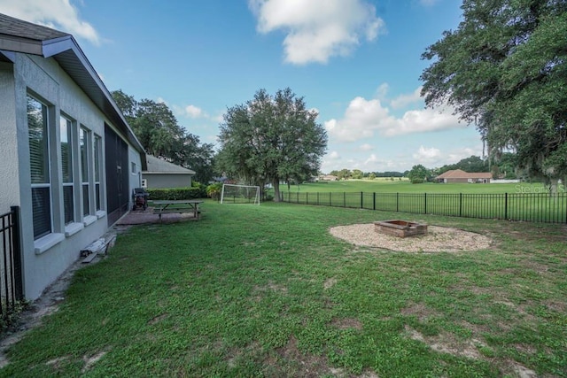 32313 Oak Canopy Dr, Sorrento, FL 32776 - view of yard with a fire pit and fence