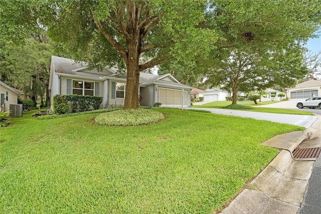 single story home with cooling unit, a front lawn, and a garage