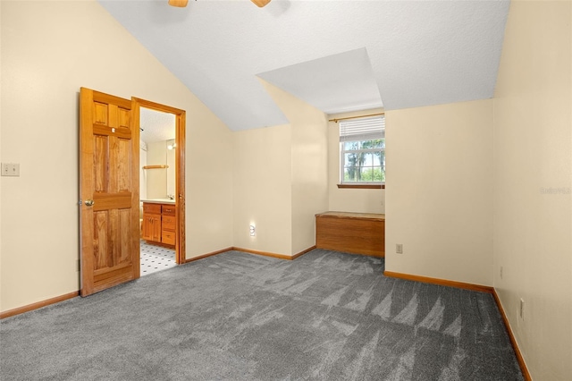 additional living space with lofted ceiling, carpet flooring, and ceiling fan