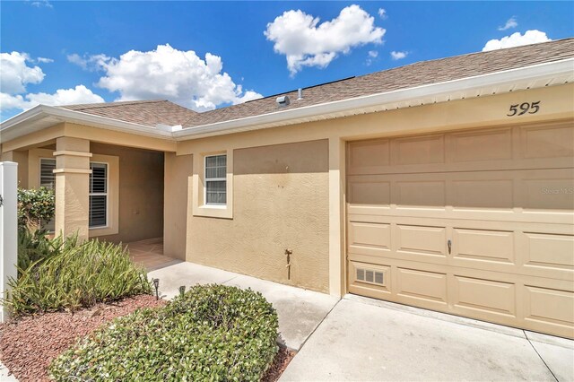 exterior space with a garage