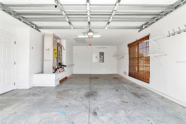 garage featuring a garage door opener and electric panel