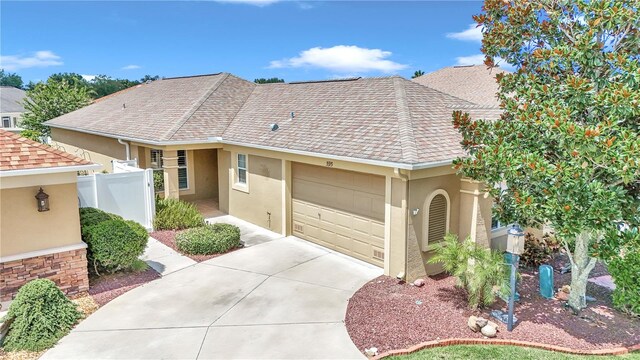 single story home with a garage