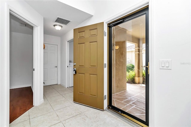 view of tiled entrance foyer