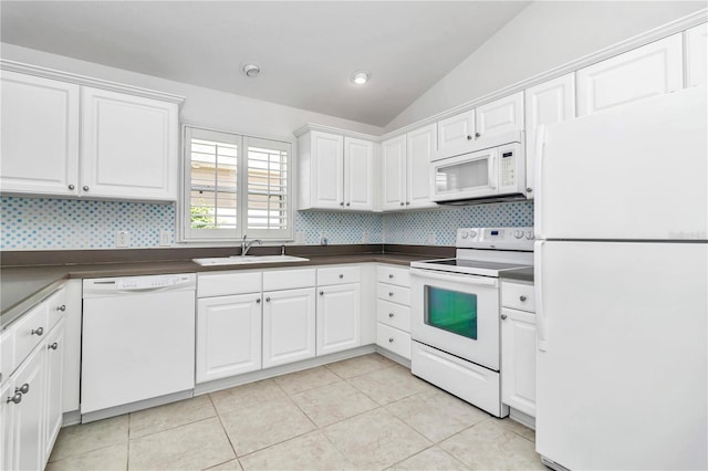 kitchen with white appliances, sink, decorative backsplash, and white cabinetry