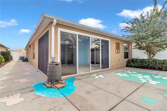 rear view of house with a patio