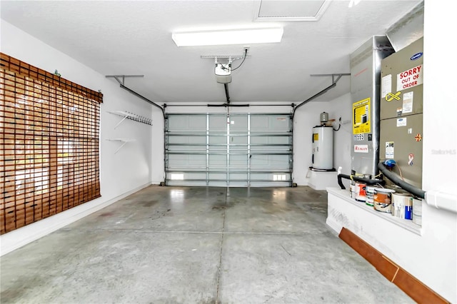 garage featuring electric water heater and a garage door opener