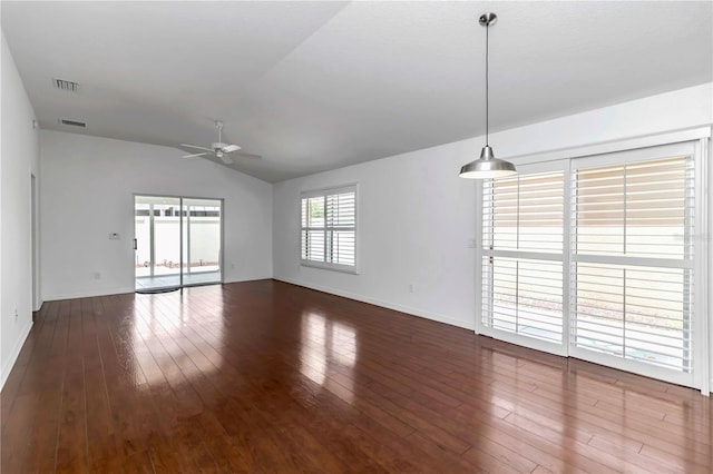 empty room featuring ceiling fan, wood-type flooring, and vaulted ceiling